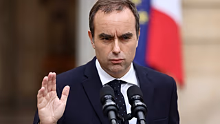 File - A microphone is set up in the courtyard for the statement by French outgoing Prime Minister Sebastien Lecornu at the Hotel Matignon in Paris. 6 Oct. 2025