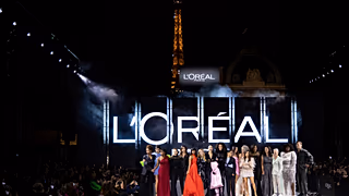 FILE - A model wears a creation for the L'Oreal ready-to-wear Spring/Summer 2023 fashion collection presented October 2022 in Paris.